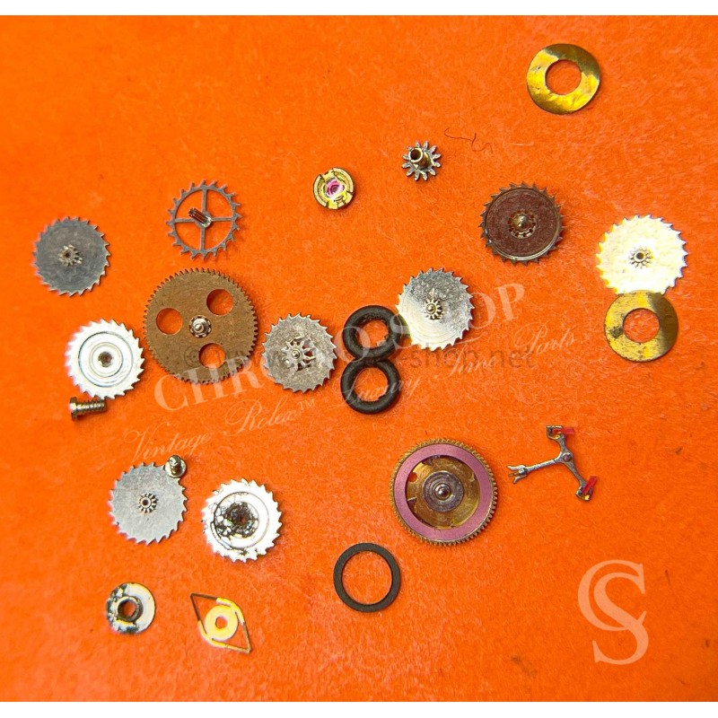ROLEX pièces d'horlogerie montres anciennes lot pièces divers roue,ancre,inverseurs etc Cal 1570,1560,3035,3135