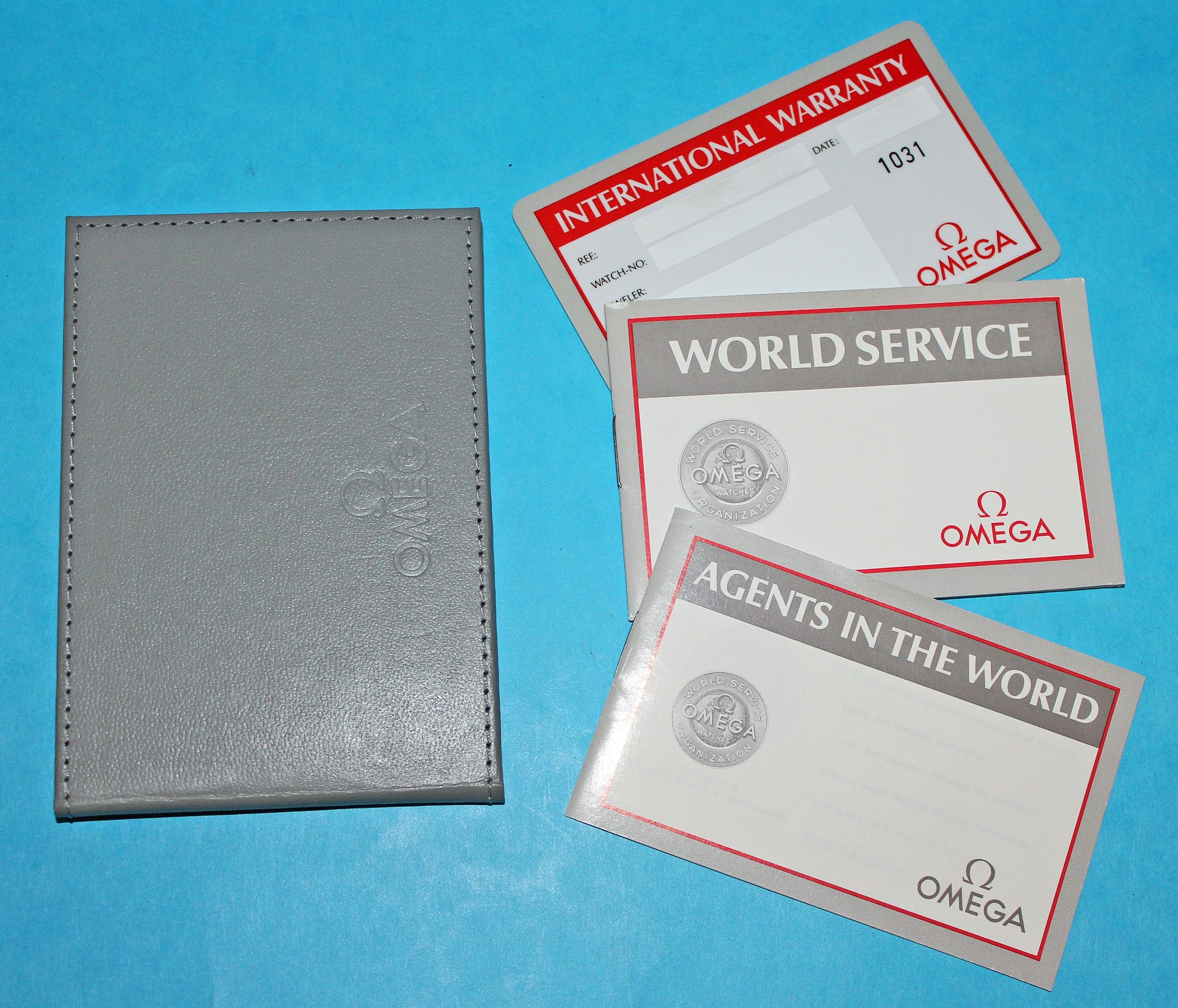 CARNET GARANTIE VIERGE MONTRES OMEGA AVEC PORTE DOCUMENTS CUIR + CARTE  REVISION